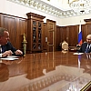 Путин обсудил с главой ВТБ состояние экономики и результаты работы банка