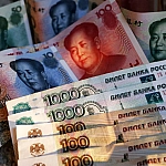 Юань снижается на Мосбирже, рубль укрепляется в ожидании заседания ЦБ