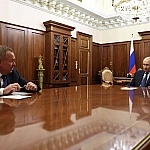 Путин обсудил с главой ВТБ состояние экономики и результаты работы банка