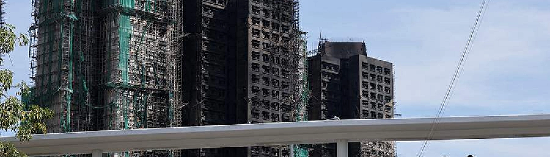 Число жертв пожара в Гонконге выросло до 128 человек